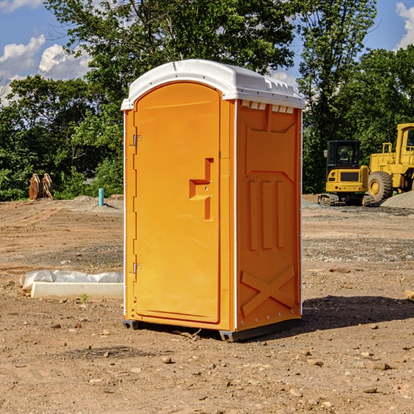 how often are the porta potties cleaned and serviced during a rental period in Dema